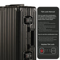 Aluminium Black Cabin suitcase with TSA lock instructions displayed.